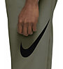 Nike Dry Graphic Dri-FIT Tape M - pantaloni fitness - uomo, Green